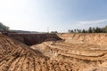 Extraction in a sand quarry with powerful machines and a washing lake Royalty Free Stock Photo