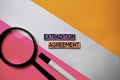 Extradition Agreement text on sticky notes with color office desk concept