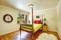 Extraordinary bedroom interior. Colorful carved wood bed with hi