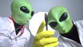 Extraterrestrials robbed someone to conduct experiments on them and torture. One of aliens took out scalpel, other gave