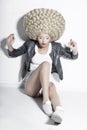 Extravagance. Eccentric Blonde Hair Model with Fantastic Updo Co