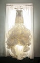 Extravagant wedding dress in window Royalty Free Stock Photo