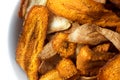 Extreme abstract detail of fried carrot and parsnip chips. Royalty Free Stock Photo
