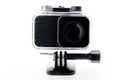 Extreme action camera at waterproof aqua-box isolated on a white background. Camera for footage 4k movies, sports and domestic lif