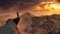 Extreme adventure composite. Man on top of a Rocky Mountain Cliff. Royalty Free Stock Photo
