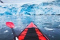 Extreme adventure sport, Antarctica kayaking, paddling on kayak between antarctic icebergs Royalty Free Stock Photo