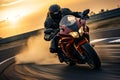 Extreme athlete on a sport bike races fast at sunset