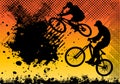 Extreme bicycle jumping with grunge background