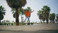 Extreme boy riding skateboard on city park. Guy skateboarder practicing skating. Royalty Free Stock Photo