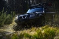 Extreme, challenge and 4x4 vehicle concept. Offroad race on nature background. Car racing in forest. SUV or offroad car Royalty Free Stock Photo