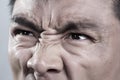 Extreme Close up on angry mans face