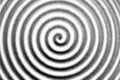 Macro Halftone Spiral Ripple Pattern on Paper Royalty Free Stock Photo