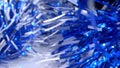 extreme close-up, detailed, bright shiny metallic tinsel. christmas background Royalty Free Stock Photo