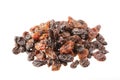 Extreme Close up of dried raisins on white background