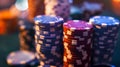 Extreme close-up of a few casino stack chips with shallow depth of field.