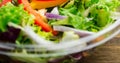 Extreme close-up of fresh vegetable salad in glass bowl on table Royalty Free Stock Photo