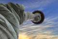 Extreme Close Up Of Hand And Torch Of Statue Of Liberty At Sunrise, Looking From Ground