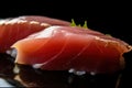 Extreme close-up of an individual piece of tuna sashimi, showcasing the distinct marbling and rich flavor of this popular sushi