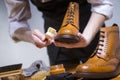 Extreme Close Up of Mans Hands Cleaning Luxury Calf Leather Brogues with Special Accessories Royalty Free Stock Photo