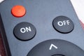 Macro of Remote Control Buttons with Red Power Button and White On Off Text Royalty Free Stock Photo