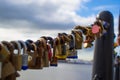 Extreme close up of multicolored padlocks or locks in the fence of a bridge in Liverpool dock, England, United Kingdom