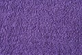 Extreme close up of a purple towel background texture