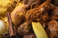 Extreme close-up of Rendang spices, including turmeric, galangal, and lemongrass, used to make the rich and aromatic curry dish