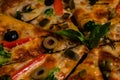 Extreme close up shot of yummy Picante pizza loaded with vagetables