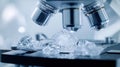 Extreme close-up view of cryogenic electron microscope. High tech equipment focusing on tiny biological sample. Advanced tech