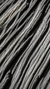 Extreme close-up of weathered grey wood texture with deep, parallel grooves and rough ridges creating a dramatic, high-contrast Royalty Free Stock Photo