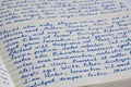 Extreme closeup of open notebook with handwritten lorem ipsum t