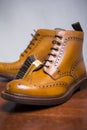 .Extreme Closeup of Premium Male Brogue Tanned Boots