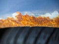 Extreme closeup of rust on vehicle above wheel