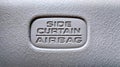 Extreme Closeup shot of a car SRS Side Curtain Airbag sign Royalty Free Stock Photo