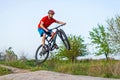 Extreme cycling concept, cyclist jumping on a mountain bike Royalty Free Stock Photo