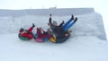 Extreme family tubing in slow motion Royalty Free Stock Photo