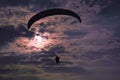 Extreme flying - paragliding at evening Royalty Free Stock Photo