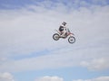 Extreme FMX stunt rider jumps high into the air Royalty Free Stock Photo
