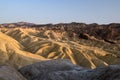 Mountain ridges of Zabriskie Point while setting sun, Death Valley National Park, California, USA Royalty Free Stock Photo