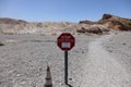 An Extreme Heat Warning sign at the beginning of the trail at Zabriskie Point in Death Valley National Park Royalty Free Stock Photo