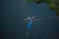 Extreme jump from the bridge. The man jumps surprisingly quickly in bungee jumping at Sky Park explores extreme fun. Bungee in the Royalty Free Stock Photo