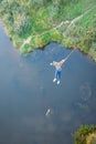 Extreme jump from the bridge. The man jumps surprisingly quickly in bungee jumping at Sky Park explores extreme fun. Bungee in the Royalty Free Stock Photo