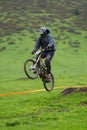 Extreme jump on downhill race Royalty Free Stock Photo