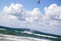 Extreme kite surfer on splashdown