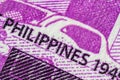 Extreme macro photography of a 100 Peso banknote. Ultra close up of a one hundred filipino peso note. Legal Tender for private and