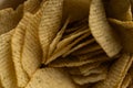 Extreme Macro Texture of Ruffled Potato Chips with Green Seasoning Royalty Free Stock Photo