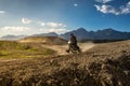 Extreme motocross on motocross track with Alps mountains in distance