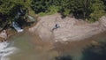 Extreme motorcyclist rides near river. Motocross. Motosport.