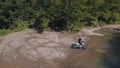 Extreme motorcyclist rides near river. Motocross. Motosport.