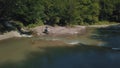 Extreme motorcyclist rides near river. Motocross. Motosport.